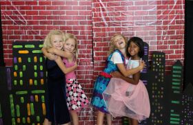 Four girls enjoing drama