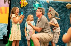 Teacher teaching drama