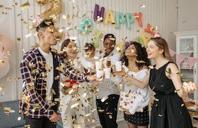 Family and Group of Friends Celebrating a Child's Birthday